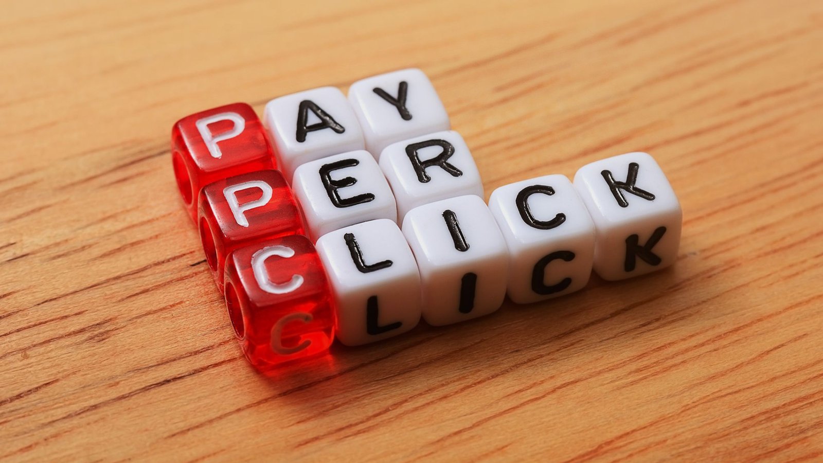 A set of dices endorsing small businesses can leverage PPC for sales growth