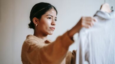 Key Factors to Consider When Buying Quality Fabrics 13 A woman checking quality fabrics before buying