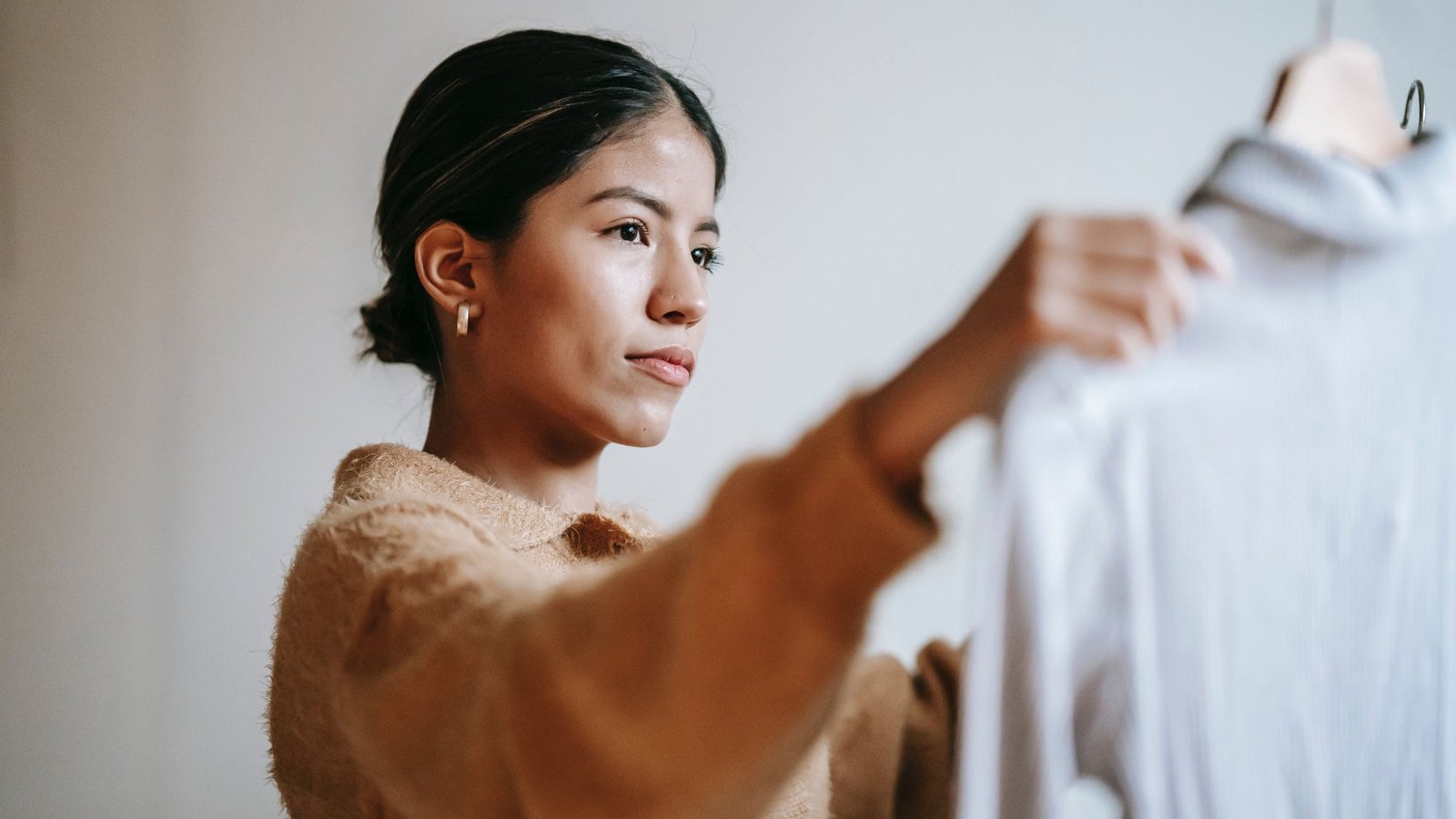 A woman checking quality fabrics before buying