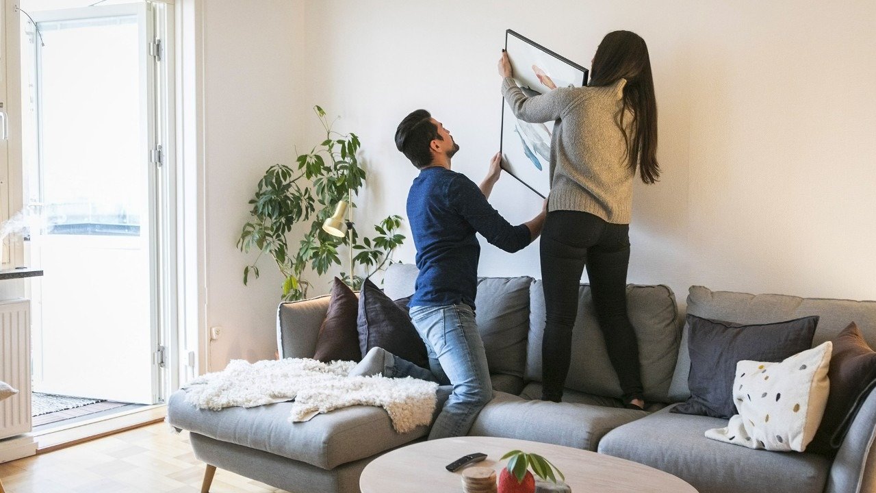 Couple Busy in Home Decor