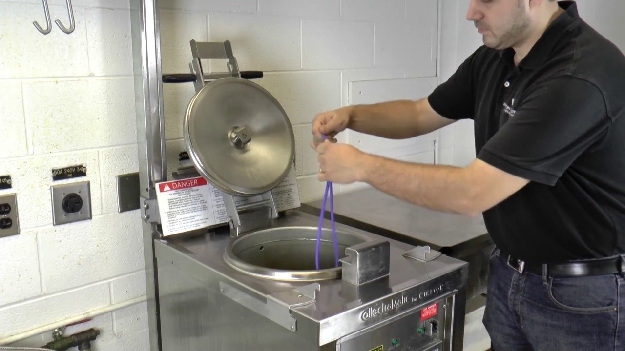 Man using pressure fryer